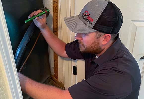 Kody Heinze from Centex Home Inspections performing a home inspection in central Texas.
